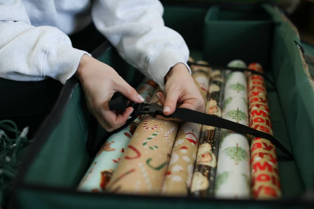 Go_Clean-Dec-2021-141 - House Work woman strapping in holiday wrapping paper