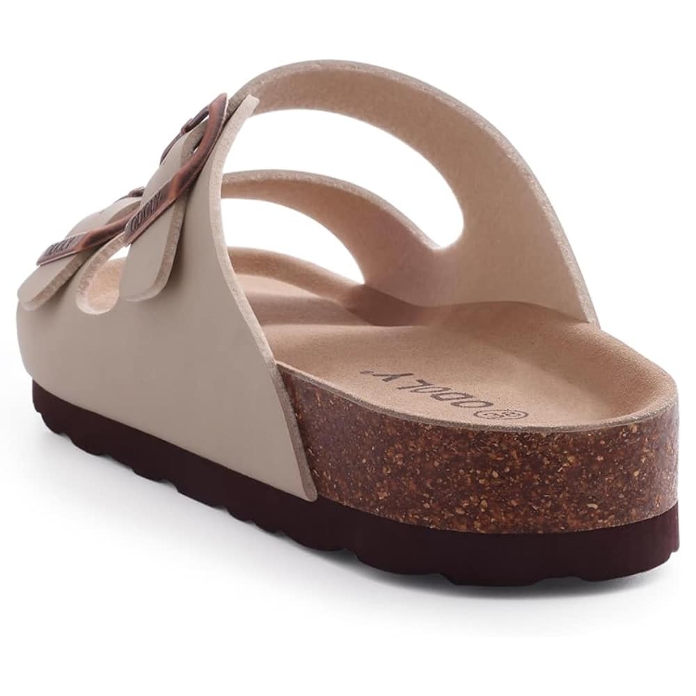 Beige cork-soled slide sandal with two buckle straps and contoured footbed
