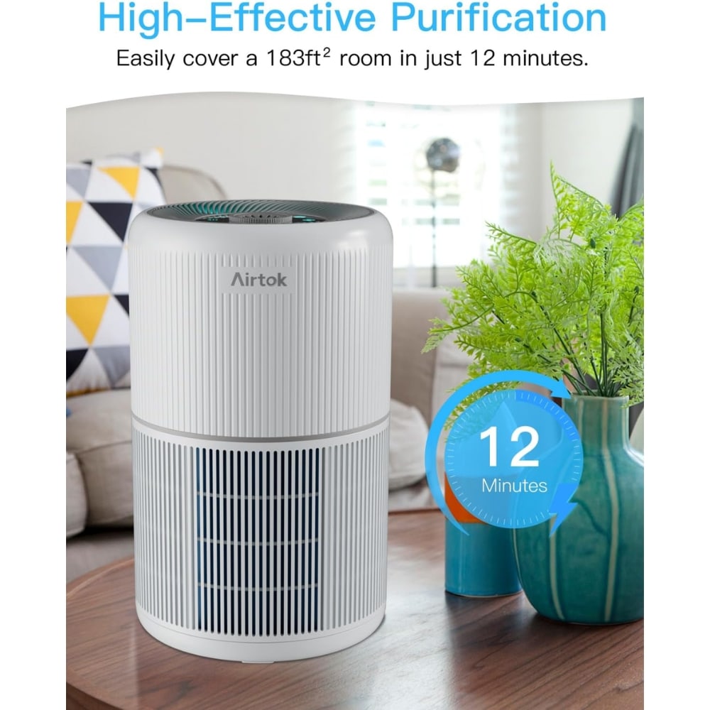 Air purifier on a wooden table in a living room, with a blue 12 Minutes badge highlighting fast purification (183 ft² in 12 minutes).