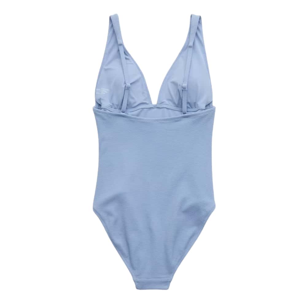 Light blue one‑piece swimsuit with a V-neck and adjustable shoulder straps on a white background.