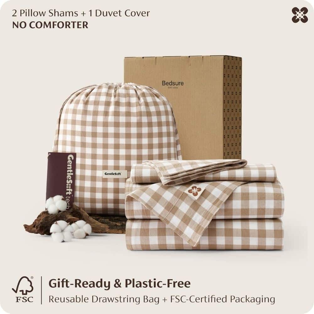 Beige gingham bedding set with two pillow shams and a duvet cover, shown with a reusable drawstring bag and FSC-certified packaging.