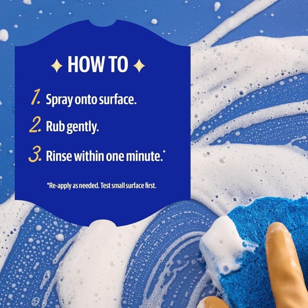 Blue sign titled 'HOW TO' with three steps: spray onto surface, rub gently, rinse within one minute; detergent bubbles in background.