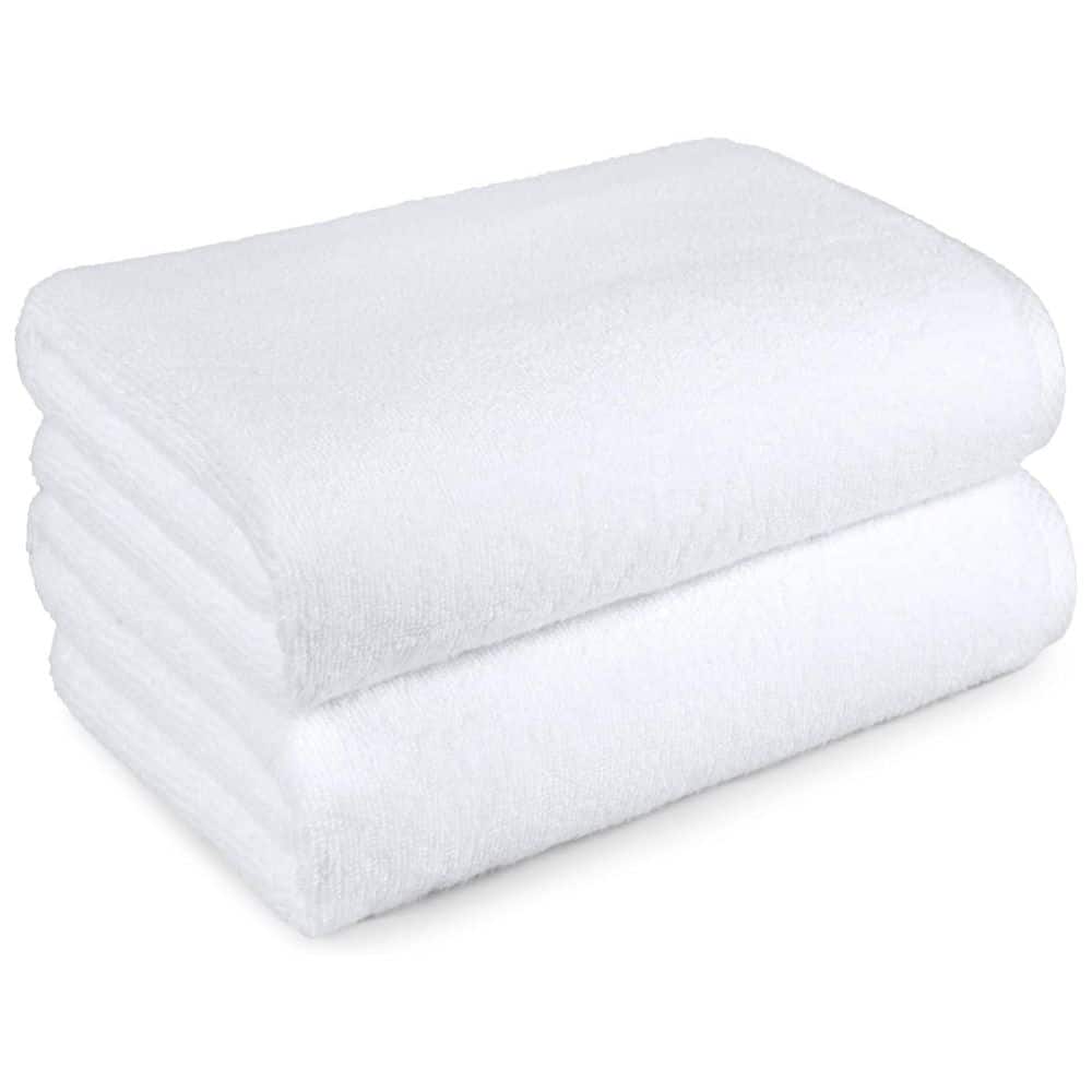 Two white bath towels folded and stacked on a white background.